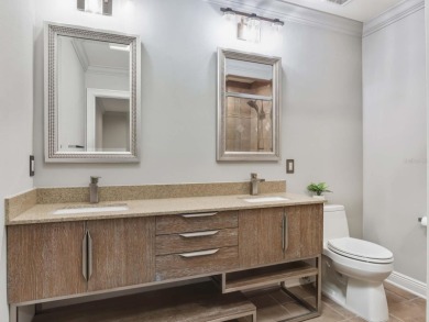 This private, tucked-away residence is perfectly located on the on Lake Nona Golf Club, Inc. in Florida - for sale on GolfHomes.com, golf home, golf lot
