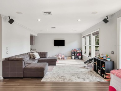 This private, tucked-away residence is perfectly located on the on Lake Nona Golf Club, Inc. in Florida - for sale on GolfHomes.com, golf home, golf lot
