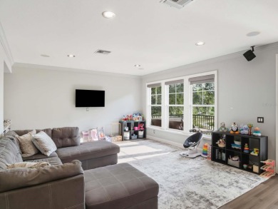 This private, tucked-away residence is perfectly located on the on Lake Nona Golf Club, Inc. in Florida - for sale on GolfHomes.com, golf home, golf lot