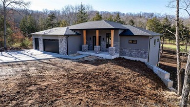 Brand-new construction in highly sought-after Old Kinderhook on The Club At Old Kinderhook in Missouri - for sale on GolfHomes.com, golf home, golf lot