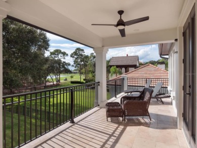 This private, tucked-away residence is perfectly located on the on Lake Nona Golf Club, Inc. in Florida - for sale on GolfHomes.com, golf home, golf lot