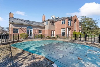 Welcome to this stunning brick colonial nestled on a 1.5 acre on Woodmere Club, Inc. in New York - for sale on GolfHomes.com, golf home, golf lot