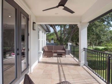 This private, tucked-away residence is perfectly located on the on Lake Nona Golf Club, Inc. in Florida - for sale on GolfHomes.com, golf home, golf lot