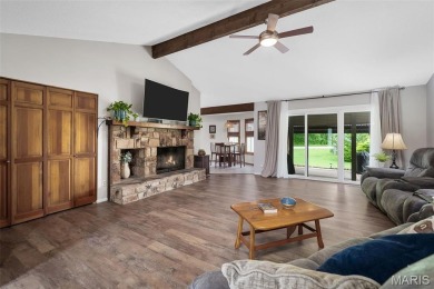 Stop the car! Updated 4 bedroom, 2 bath home tucked away in a on Lake Saint Louis Par 3 in Missouri - for sale on GolfHomes.com, golf home, golf lot