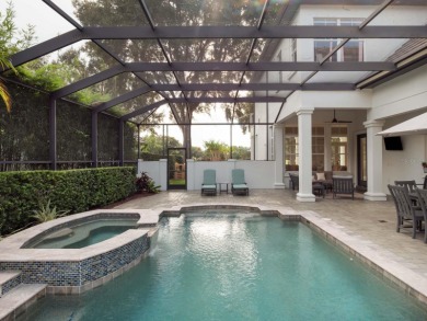 This private, tucked-away residence is perfectly located on the on Lake Nona Golf Club, Inc. in Florida - for sale on GolfHomes.com, golf home, golf lot