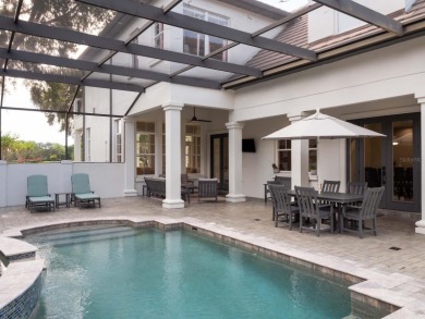 This private, tucked-away residence is perfectly located on the on Lake Nona Golf Club, Inc. in Florida - for sale on GolfHomes.com, golf home, golf lot