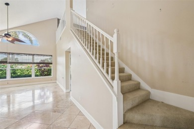 Enjoy refined living in this elegant 3-bedroom, 2.5-bath home on Falcon Watch Golf Club in Florida - for sale on GolfHomes.com, golf home, golf lot
