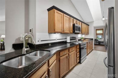 Stop the car! Updated 4 bedroom, 2 bath home tucked away in a on Lake Saint Louis Par 3 in Missouri - for sale on GolfHomes.com, golf home, golf lot