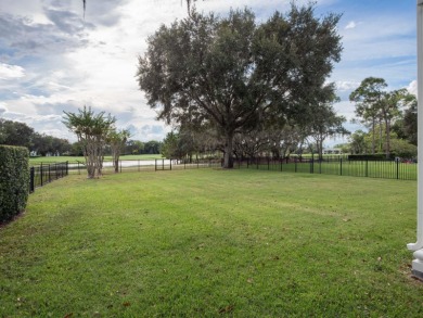 This private, tucked-away residence is perfectly located on the on Lake Nona Golf Club, Inc. in Florida - for sale on GolfHomes.com, golf home, golf lot