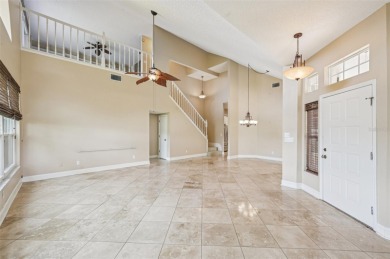 Enjoy refined living in this elegant 3-bedroom, 2.5-bath home on Falcon Watch Golf Club in Florida - for sale on GolfHomes.com, golf home, golf lot