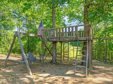 Welcome to 1046 Covered Bridge Trail - a spacious and elegant on The Preserve At Jordan Lake Golf Club in North Carolina - for sale on GolfHomes.com, golf home, golf lot