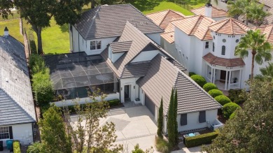 This private, tucked-away residence is perfectly located on the on Lake Nona Golf Club, Inc. in Florida - for sale on GolfHomes.com, golf home, golf lot