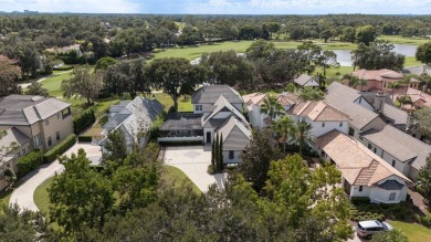 This private, tucked-away residence is perfectly located on the on Lake Nona Golf Club, Inc. in Florida - for sale on GolfHomes.com, golf home, golf lot