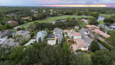 This private, tucked-away residence is perfectly located on the on Lake Nona Golf Club, Inc. in Florida - for sale on GolfHomes.com, golf home, golf lot
