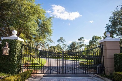 This private, tucked-away residence is perfectly located on the on Lake Nona Golf Club, Inc. in Florida - for sale on GolfHomes.com, golf home, golf lot