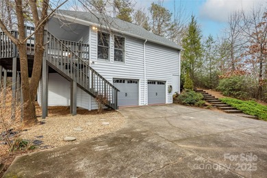 Newly painted exterior and Turnkey, with a rental history to on Rumbling Bald Resort on Lake Lure in North Carolina - for sale on GolfHomes.com, golf home, golf lot