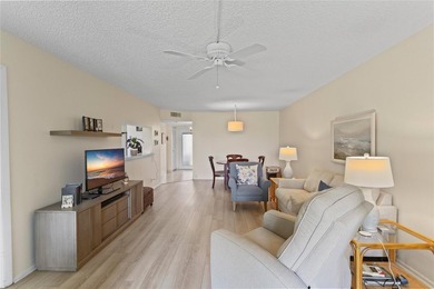 LOWEST PRICED THREE BEDROOM UNIT!! TOP SCHOOL DISTRICT! Spacious on  in Florida - for sale on GolfHomes.com, golf home, golf lot
