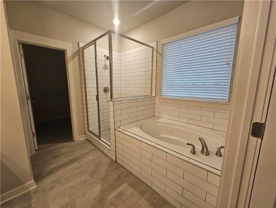 ONLY A FEW HOMES REMAIN IN THE LINKS SECTION OF TRADITOINS OF on Traditions of Braselton Golf Club in Georgia - for sale on GolfHomes.com, golf home, golf lot