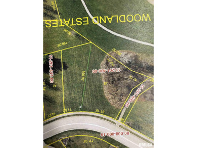 THIS BUILDING SITE LOCATED IN WOODLAND ESTATES IS A LITTLE on Macomb Country Club in Illinois - for sale on GolfHomes.com, golf home, golf lot