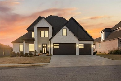 Experience luxury living in this 2023 custom-built home located on Shadow Valley Country Club in Arkansas - for sale on GolfHomes.com, golf home, golf lot