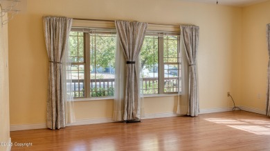 Beautifully maintained 4 bed, 3 bath custom home with 2,624 sq on The Golf Club At Devils Tower in Wyoming - for sale on GolfHomes.com, golf home, golf lot
