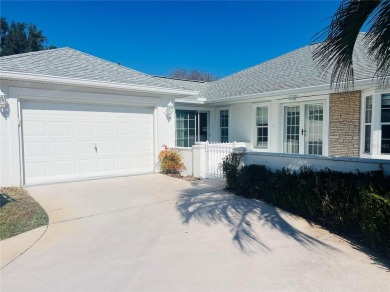 Charming Florida Designed Sun Terrace-Courtyard Entry Home on Royal Oaks Golf Club in Florida - for sale on GolfHomes.com, golf home, golf lot