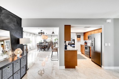 Your home search ends here in the highly desirable Palm Beach on Palm Beach National Golf and Country Club in Florida - for sale on GolfHomes.com, golf home, golf lot