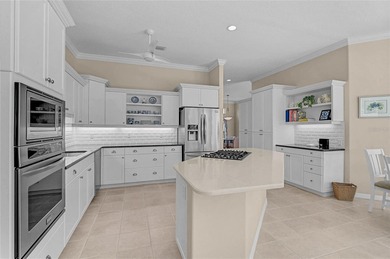 Welcome to this exceptional residence in the sought-after on Calusa Lakes Golf Club in Florida - for sale on GolfHomes.com, golf home, golf lot