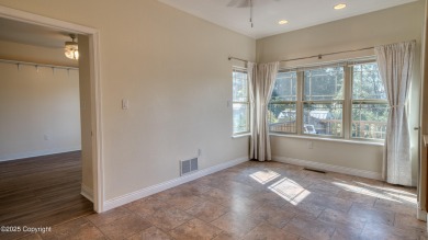 Beautifully maintained 4 bed, 3 bath custom home with 2,624 sq on The Golf Club At Devils Tower in Wyoming - for sale on GolfHomes.com, golf home, golf lot