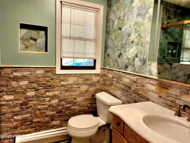 Entertainers delight inside and out with surprise lake view and on Lords Valley Country Club, Inc in Pennsylvania - for sale on GolfHomes.com, golf home, golf lot