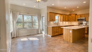 Beautifully maintained 4 bed, 3 bath custom home with 2,624 sq on The Golf Club At Devils Tower in Wyoming - for sale on GolfHomes.com, golf home, golf lot