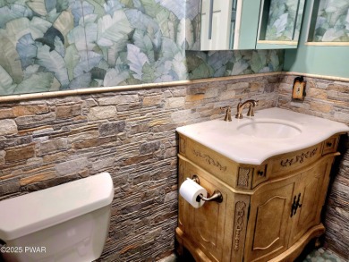 Entertainers delight inside and out with surprise lake view and on Lords Valley Country Club, Inc in Pennsylvania - for sale on GolfHomes.com, golf home, golf lot