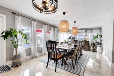 Your home search ends here in the highly desirable Palm Beach on Palm Beach National Golf and Country Club in Florida - for sale on GolfHomes.com, golf home, golf lot