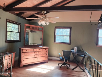 Entertainers delight inside and out with surprise lake view and on Lords Valley Country Club, Inc in Pennsylvania - for sale on GolfHomes.com, golf home, golf lot