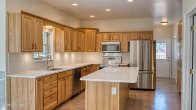 Beautifully maintained 4 bed, 3 bath custom home with 2,624 sq on The Golf Club At Devils Tower in Wyoming - for sale on GolfHomes.com, golf home, golf lot