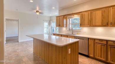 Beautifully maintained 4 bed, 3 bath custom home with 2,624 sq on The Golf Club At Devils Tower in Wyoming - for sale on GolfHomes.com, golf home, golf lot