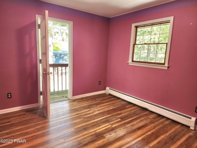 Entertainers delight inside and out with surprise lake view and on Lords Valley Country Club, Inc in Pennsylvania - for sale on GolfHomes.com, golf home, golf lot