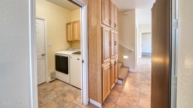 Beautifully maintained 4 bed, 3 bath custom home with 2,624 sq on The Golf Club At Devils Tower in Wyoming - for sale on GolfHomes.com, golf home, golf lot