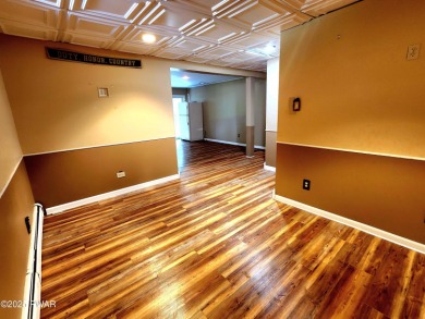 Entertainers delight inside and out with surprise lake view and on Lords Valley Country Club, Inc in Pennsylvania - for sale on GolfHomes.com, golf home, golf lot