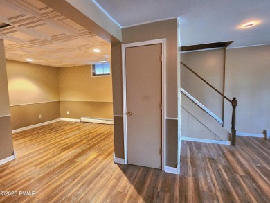 Entertainers delight inside and out with surprise lake view and on Lords Valley Country Club, Inc in Pennsylvania - for sale on GolfHomes.com, golf home, golf lot
