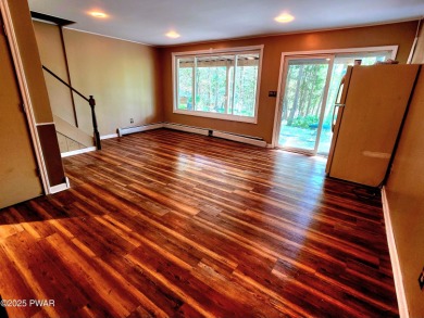 Entertainers delight inside and out with surprise lake view and on Lords Valley Country Club, Inc in Pennsylvania - for sale on GolfHomes.com, golf home, golf lot