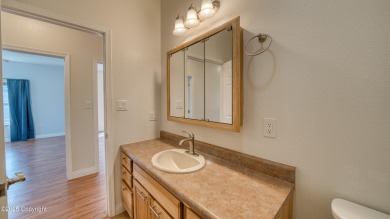 Beautifully maintained 4 bed, 3 bath custom home with 2,624 sq on The Golf Club At Devils Tower in Wyoming - for sale on GolfHomes.com, golf home, golf lot