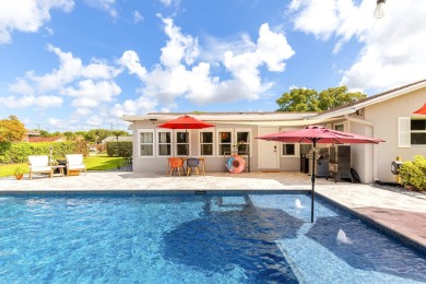 Your home search ends here in the highly desirable Palm Beach on Palm Beach National Golf and Country Club in Florida - for sale on GolfHomes.com, golf home, golf lot