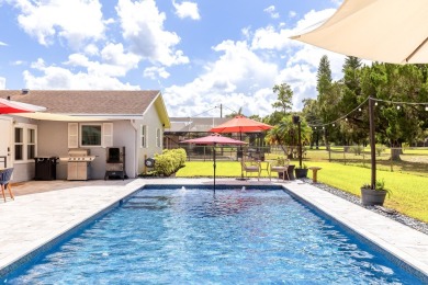 Your home search ends here in the highly desirable Palm Beach on Palm Beach National Golf and Country Club in Florida - for sale on GolfHomes.com, golf home, golf lot