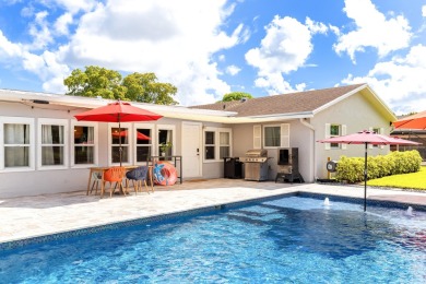 Your home search ends here in the highly desirable Palm Beach on Palm Beach National Golf and Country Club in Florida - for sale on GolfHomes.com, golf home, golf lot