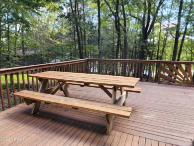 Entertainers delight inside and out with surprise lake view and on Lords Valley Country Club, Inc in Pennsylvania - for sale on GolfHomes.com, golf home, golf lot
