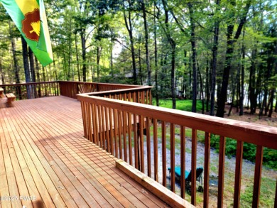 Entertainers delight inside and out with surprise lake view and on Lords Valley Country Club, Inc in Pennsylvania - for sale on GolfHomes.com, golf home, golf lot