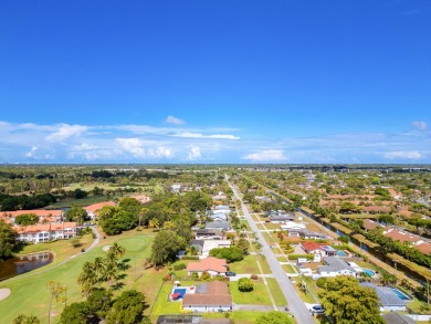Your home search ends here in the highly desirable Palm Beach on Palm Beach National Golf and Country Club in Florida - for sale on GolfHomes.com, golf home, golf lot