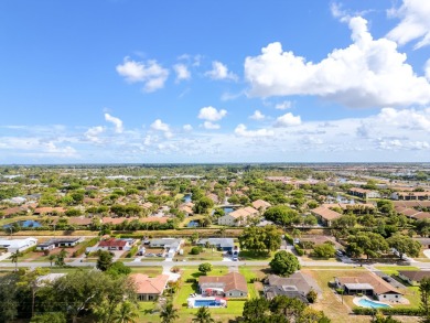 Your home search ends here in the highly desirable Palm Beach on Palm Beach National Golf and Country Club in Florida - for sale on GolfHomes.com, golf home, golf lot