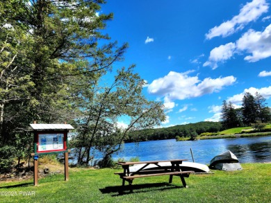 Entertainers delight inside and out with surprise lake view and on Lords Valley Country Club, Inc in Pennsylvania - for sale on GolfHomes.com, golf home, golf lot